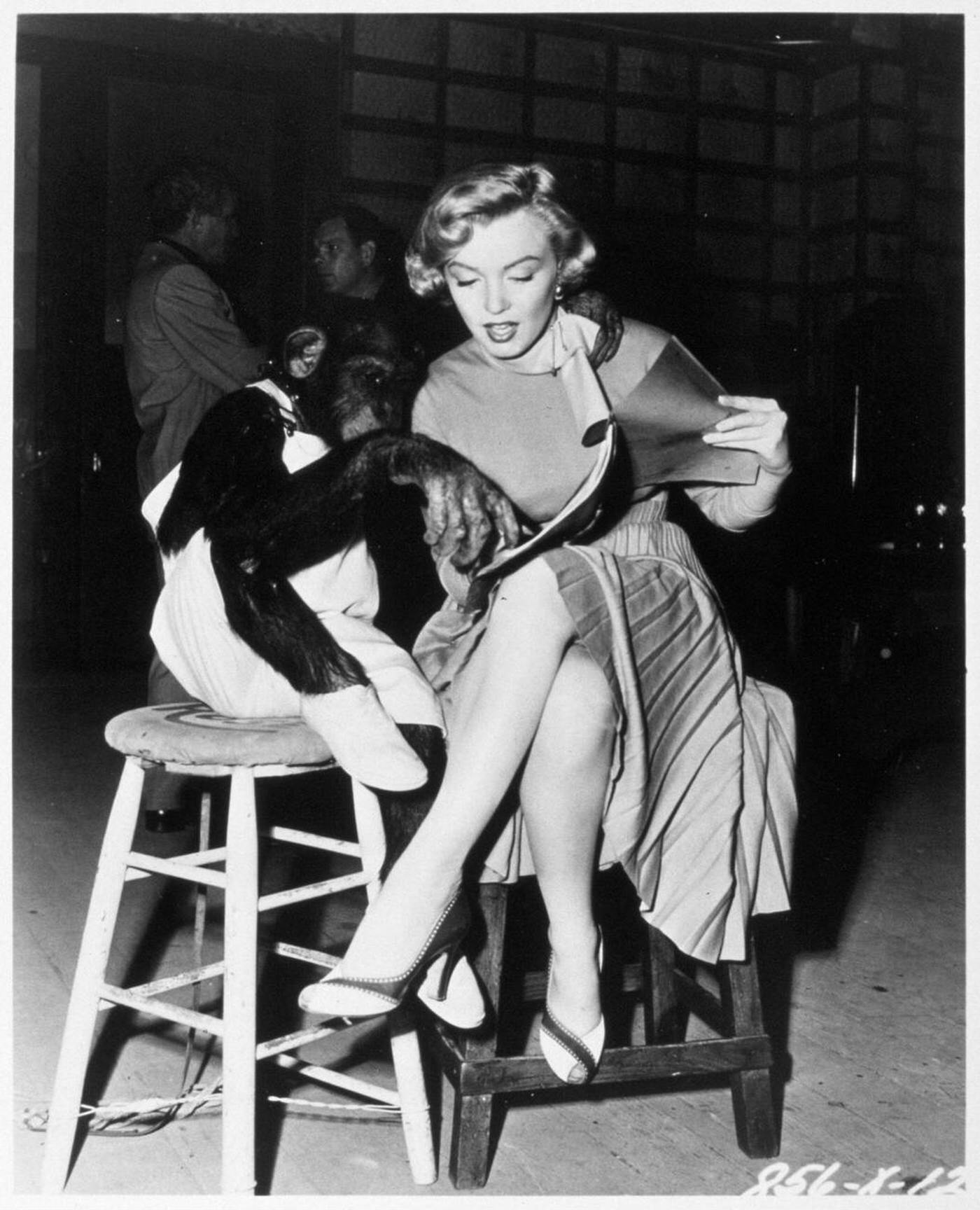 Marilyn Monroe With A Chimpanzee On The Set Of 'Monkey Business', 1952.