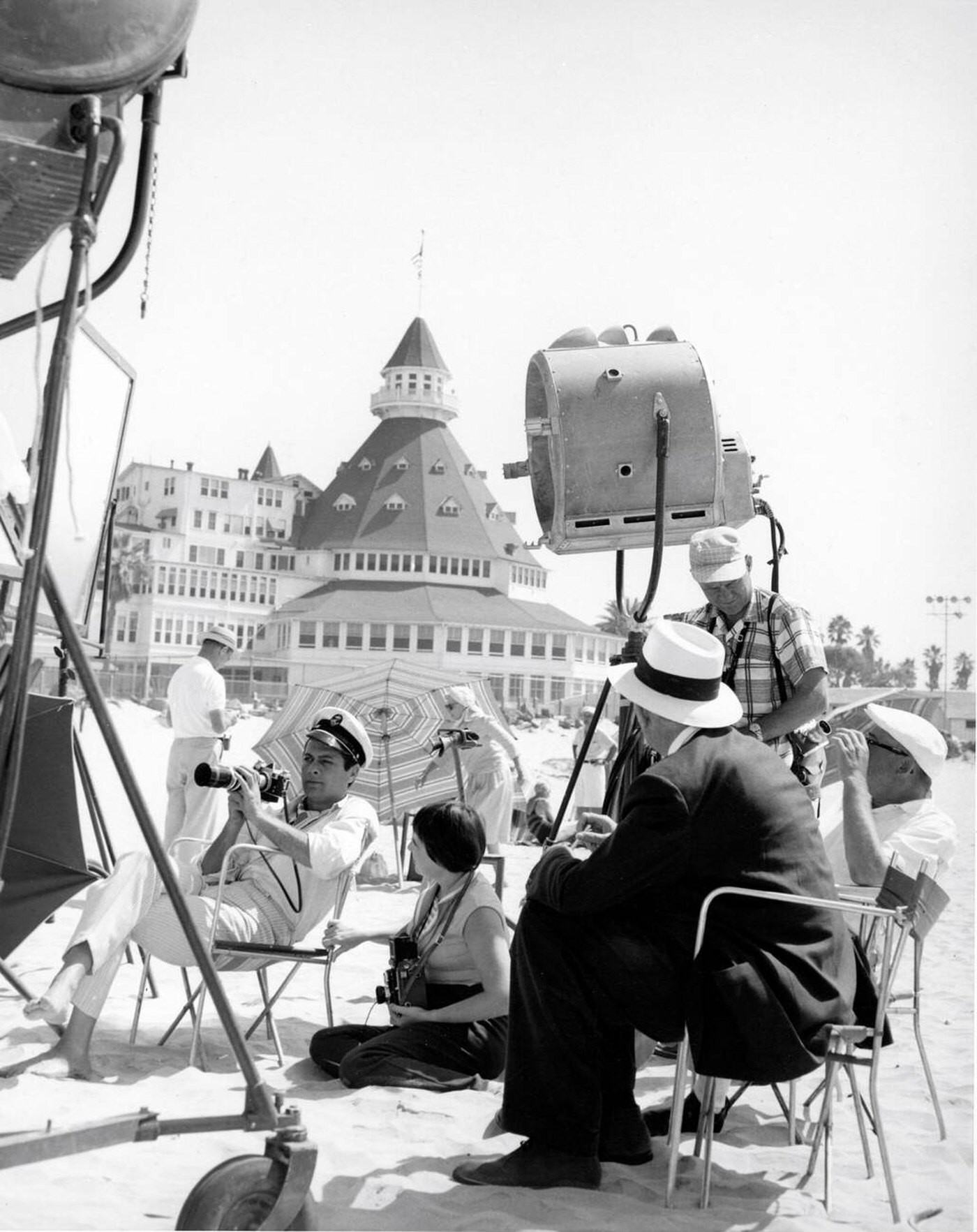 Tony Curtis On Location On Coronado Beach, California With Film Crew Including Billy Wilder During Filming Of &Amp;Quot;Some Like It Hot&Amp;Quot;, 1959.