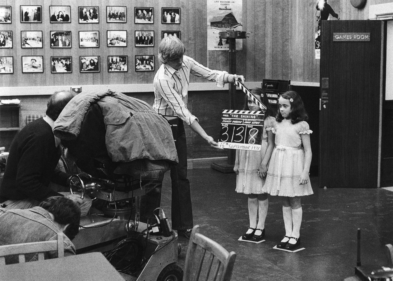 Lisa And Louise Burns, Who Portrayed The Grady Sisters, Prepare For A Shot On The Games Room Set. Kelvin Pike Operates The Camera And Camera Assistant Peter Robinson Holds The Slate.