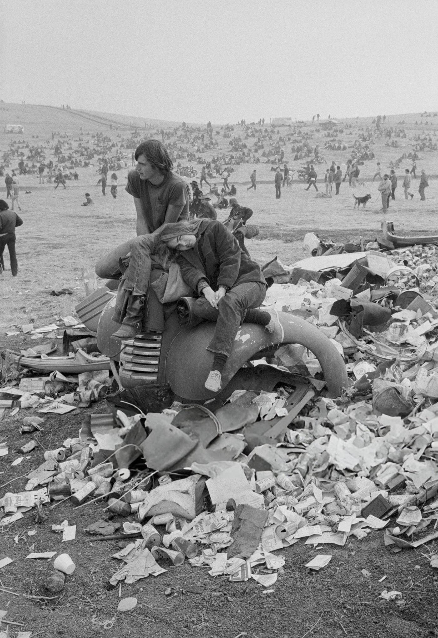 A Couple Resting At The Altamont Free Concert, 1969.