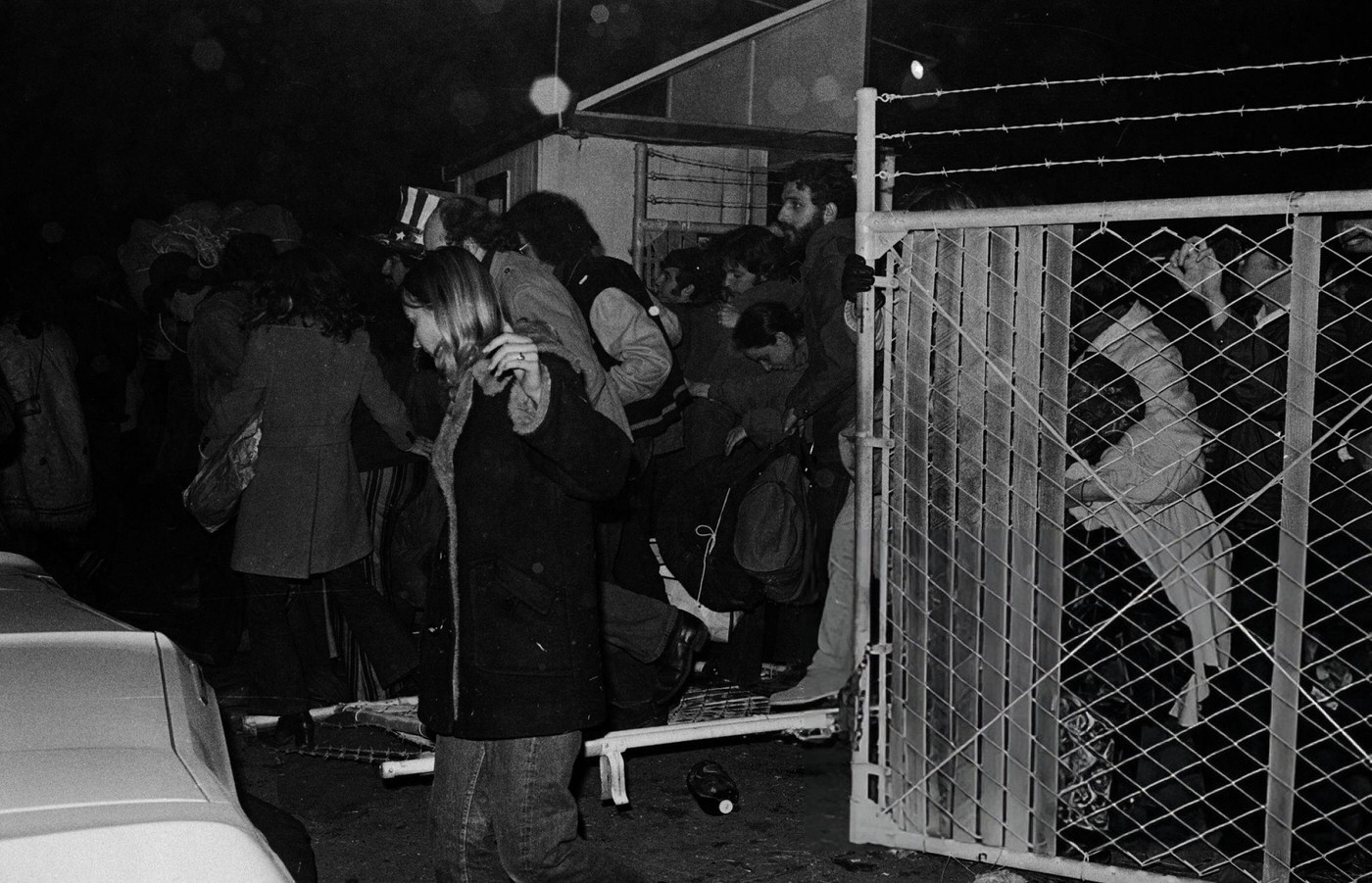 Fans Storm The Gate At Altamont Speedway For The Altamont Free Concert, 1969.