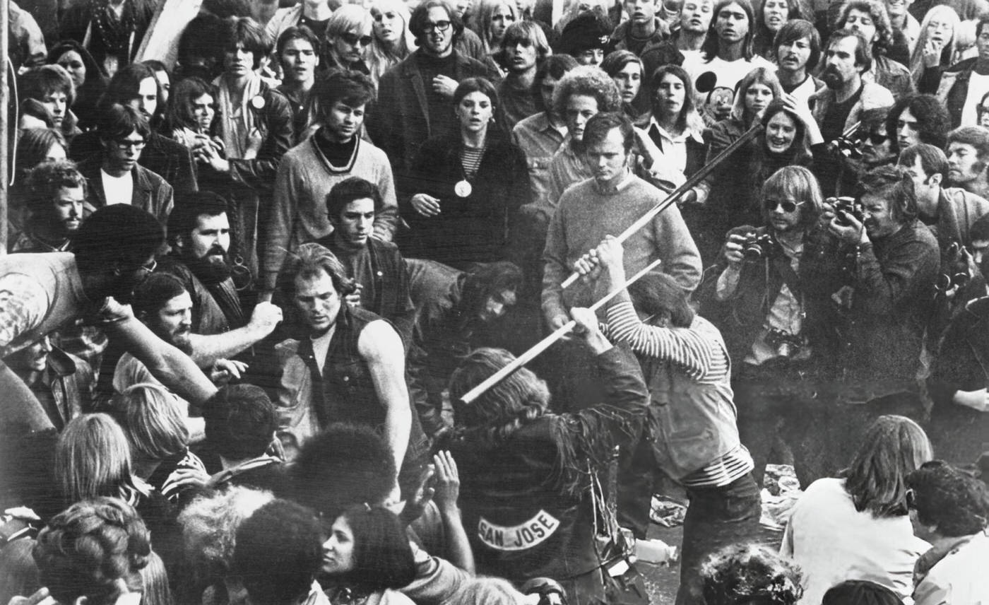 Audience Members Watching The Hells Angels Beat A Fan At The Altamont Free Concert In Gimme Shelter, 1969.