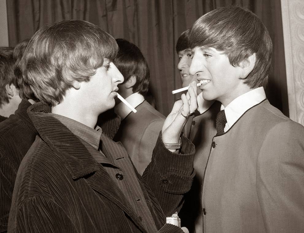 Ringo Starr Eases The Pain On A Wax Likeness Of Himself With A Cigarette, During The Unveiling Ceremony For Four Wax Models Of The Beatles At Madame Tussaud'S Waxworks, In London, England, April 29, 1964.