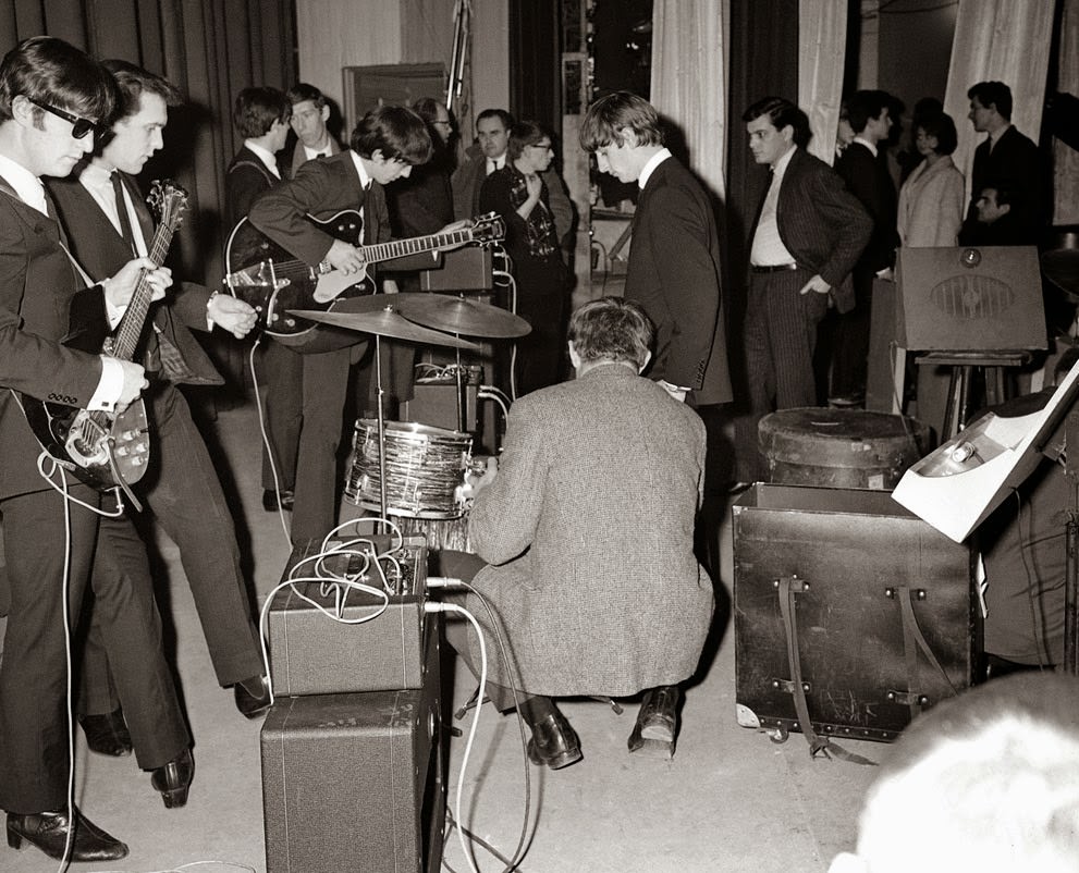 John Lennon, George Harrison, And Ringo Starr Of The Beatles Backstage In Versailles, France, January 15, 1964.