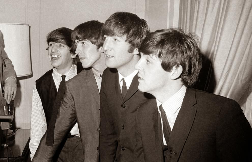 The Beatles, From Left, Ringo Starr, George Harrison, John Lennon, And Paul Mccartney, In Their New York Hotel After Their Arrival In The U.s., February 7, 1964. The British Rock Group Was Pelted With Jelly Beans And Candy Kisses By Screaming Fans On Their First American Tour.
