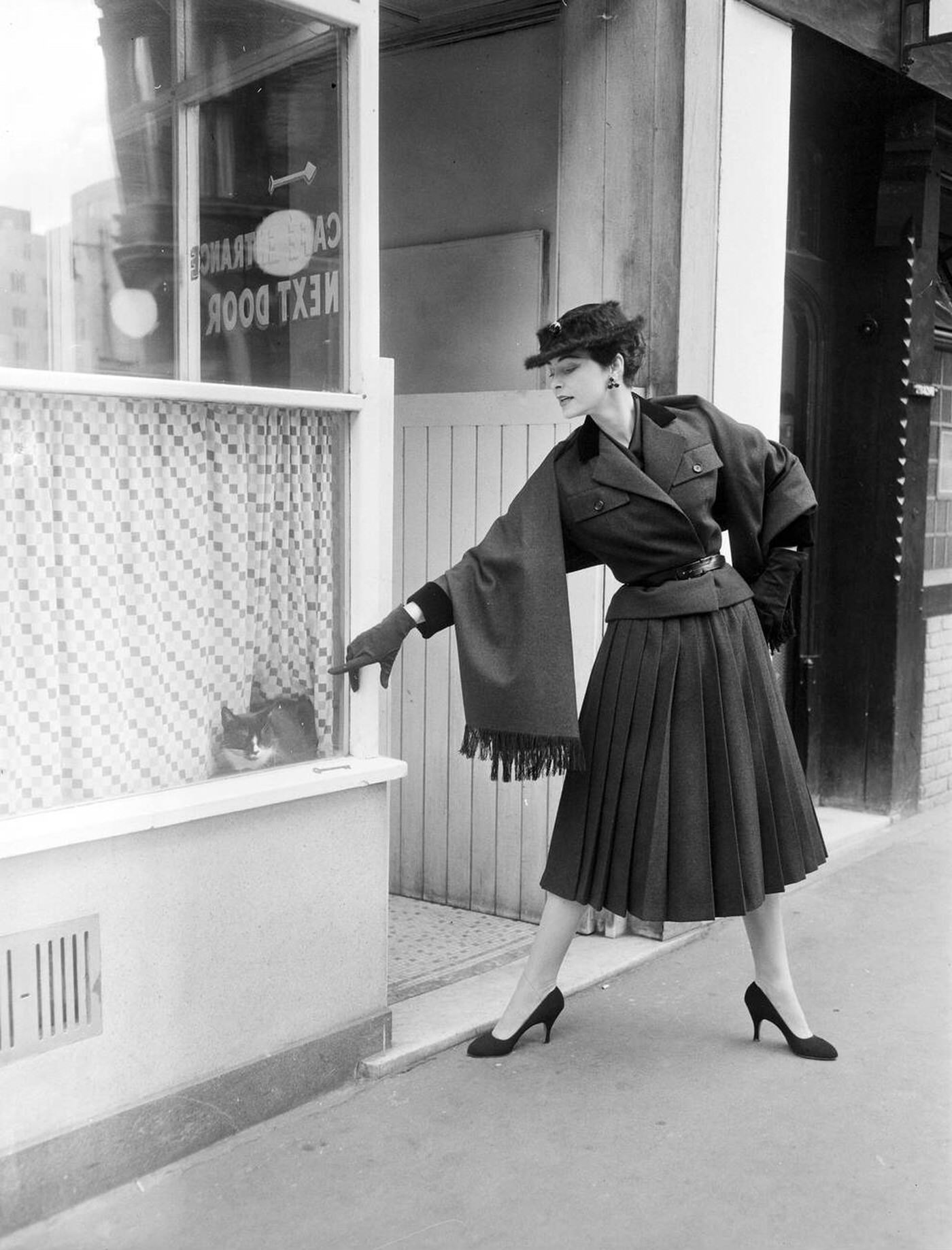 Va Et Vient, A Creation In Hand Made Shetland Wool With A Pleated Skirt, At The Christian Dior London Winter Mid Season Collection, 1955.