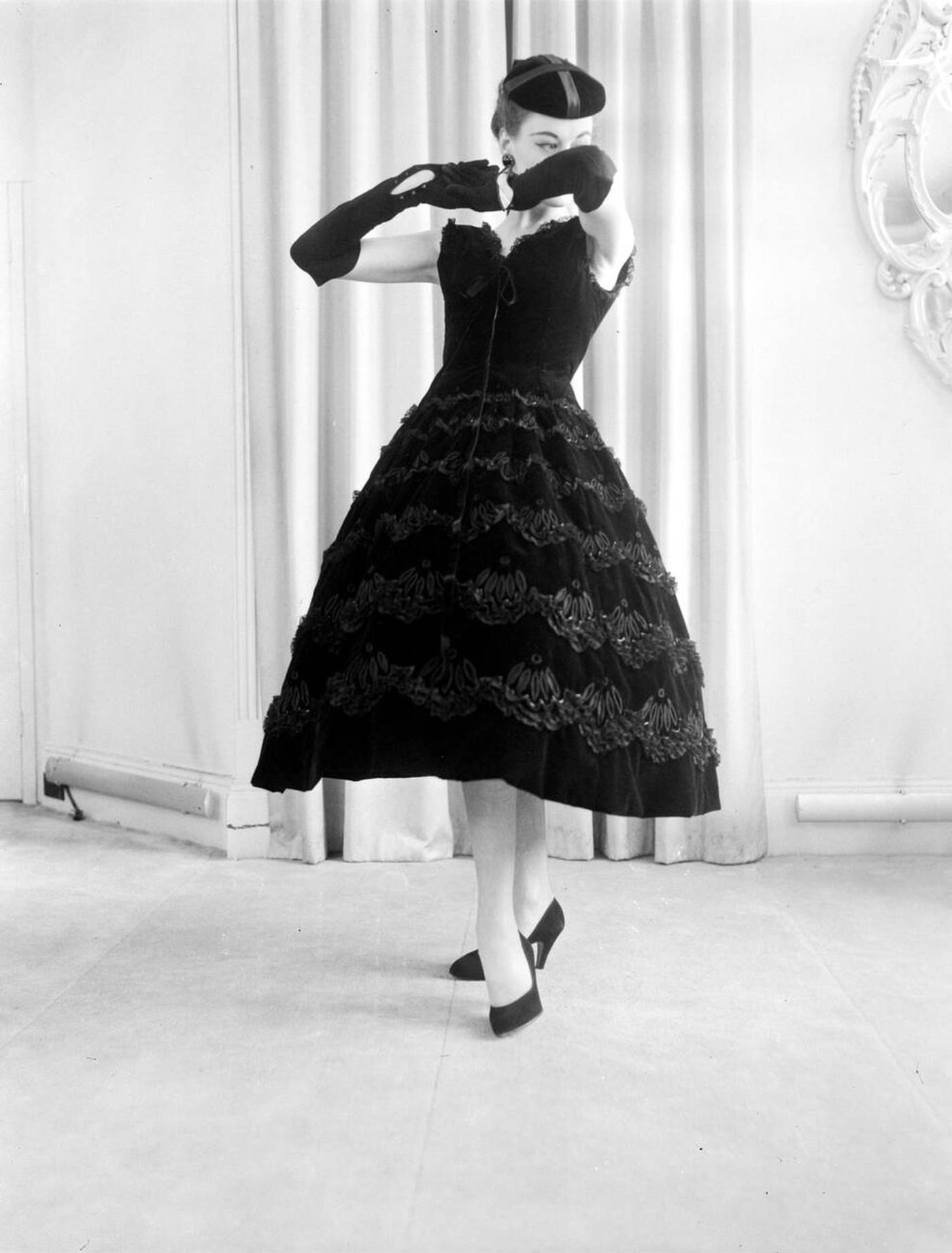 Bistro, In Black Velvet With Eyelet Embroidery Outline In Lace, At The Christian Dior London Winter Mid Season Collection, 1955.
