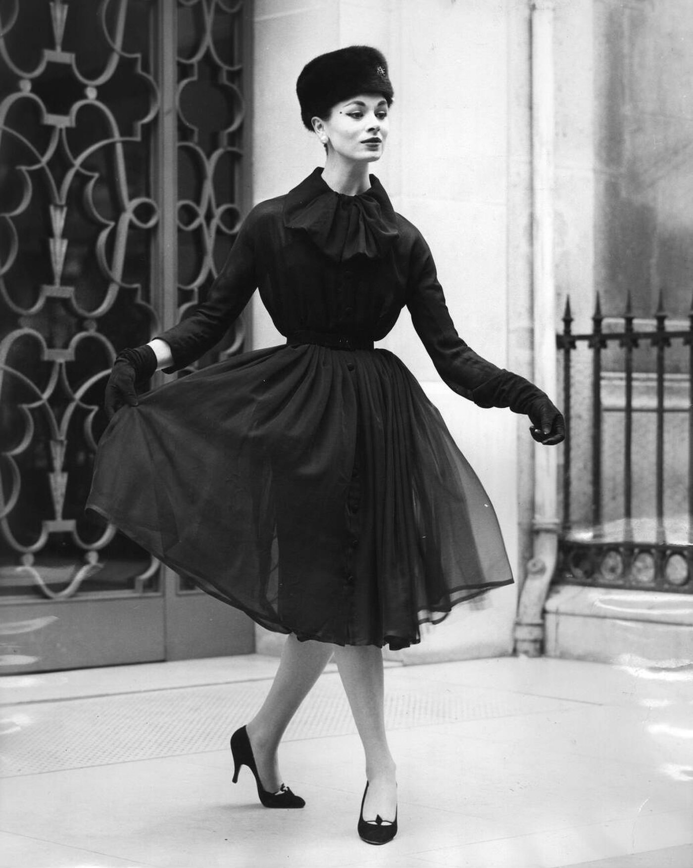 A Woman Wearing Suit, Ushanka And Gloves By Christian Dior, 1956.