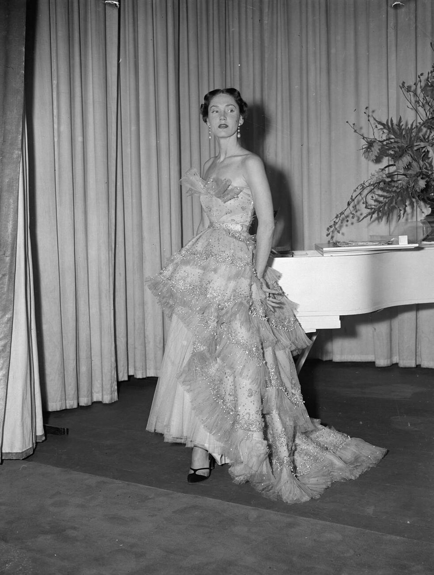 A Dior Gown Titled Mozart, The Most Expensive Gown At The Paris Fashion Show, Is Shown At The Savoy Hotel, 1950.