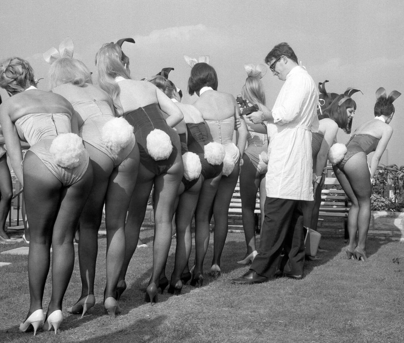 The Bunny Girls Line Up For Mike Steel Who Vaccinated Them Against Influenza At The Playboy Club In Park Lane, London, 1966.