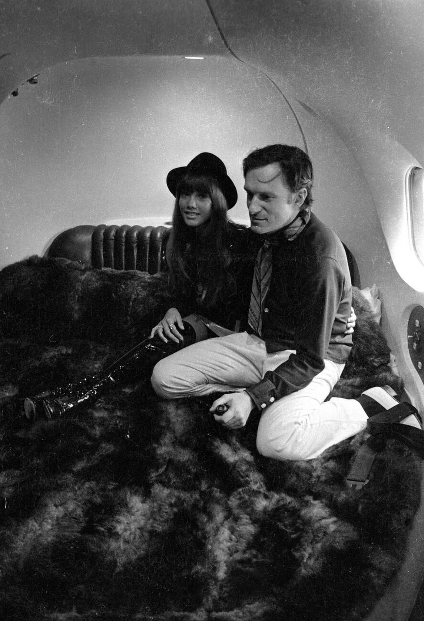Hugh Hefner And Barbi Benton On A Lying Area In His Private Jet, 1970.