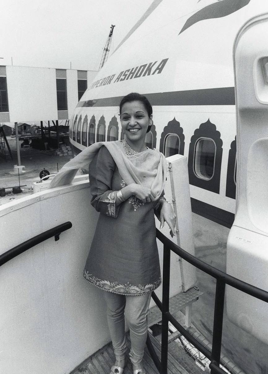 Stewardess Aban Mistry Models The Air-India Uniform Next To The Taj Mahalian Decor Of An Air-India 'Jumbo Jet', 1971.