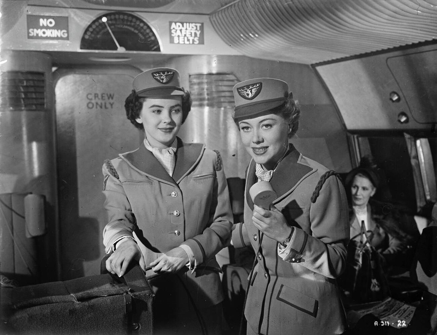 Glynis Johns And Jill Clifford Appear In The Twentieth Century Fox Film Version Of Nevil Shute'S Aviation Novel ' No Highway ' Wearing Specially Designed Grey Uniforms With A Reindeer Badge, 1950.