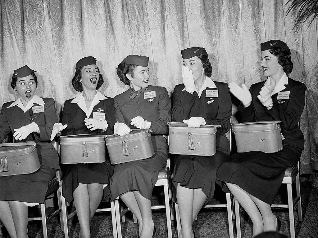 Flight Attendants Donned Crisp Collars And White Gloves, With Perfect Coifs Under Their Caps, 1956.