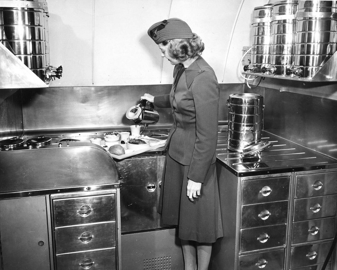 Twa Stewardess Preparing Passenger Meal In The Aircrafts' Galley, 1946.