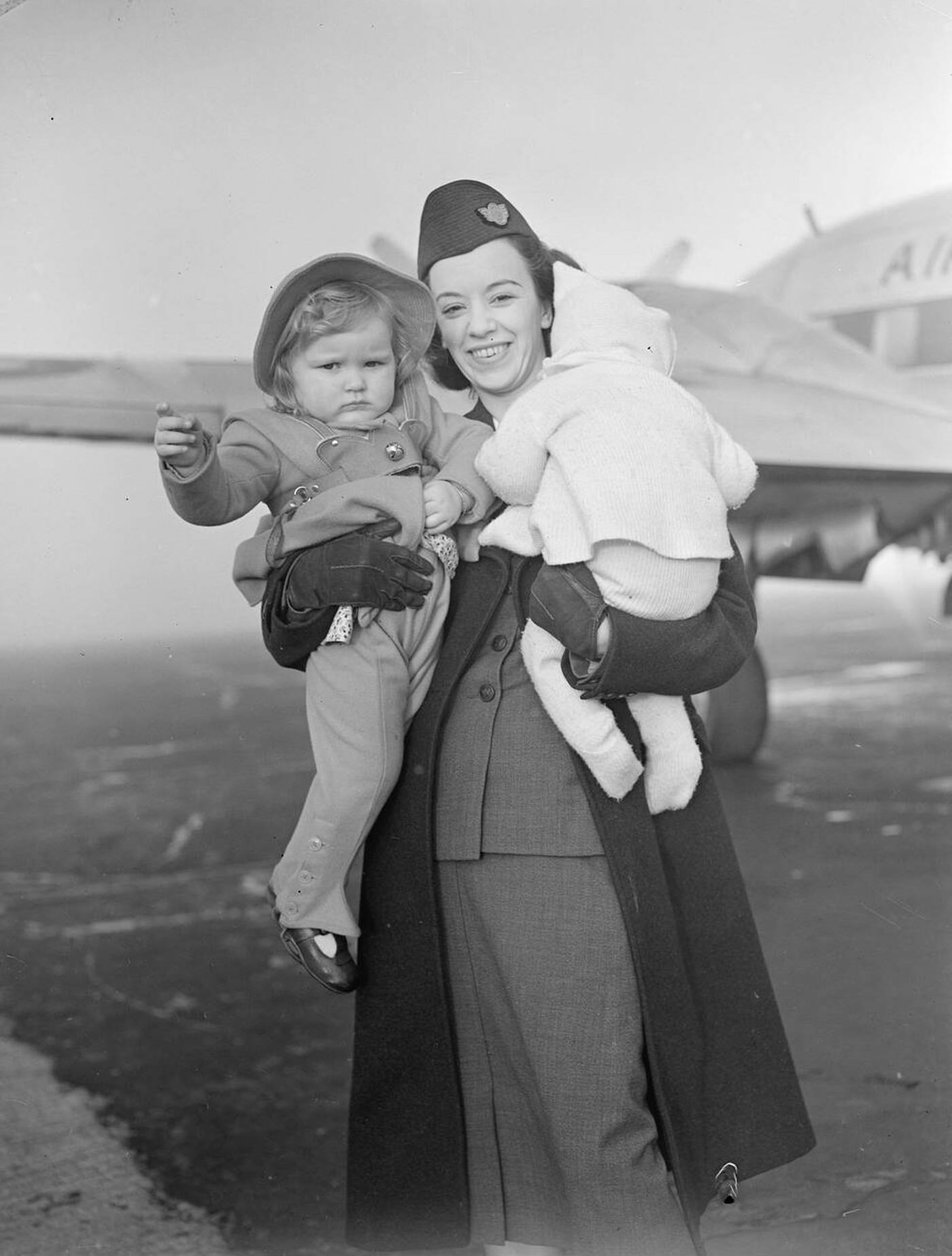 Air Hostess Takes Sheila Derwin And Carol West Aboard The Aircraft At Blackbushe Airport For Flight To Middle East, 1949.