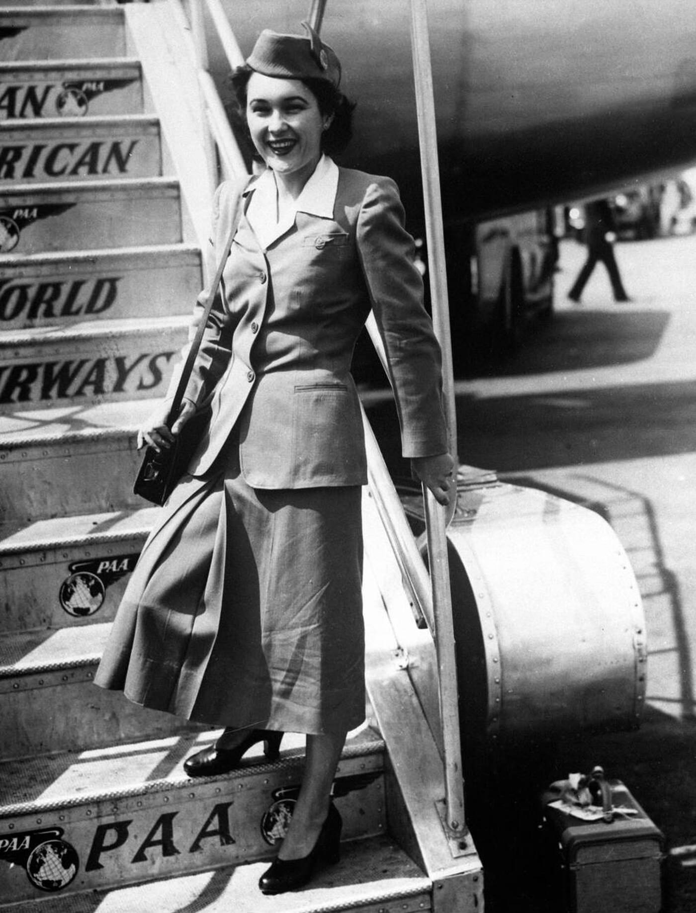 Stewardess Priscilla Nolin Is On The Steps Of A Pan-American Stratocruiser At London Airport After Coming Top Of Her Class At The Company'S Stewardess School, 1949.
