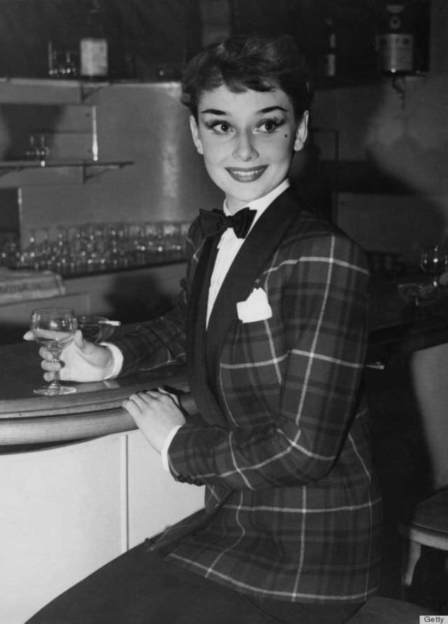 Don’t Be Afraid To Rock A Bow Tie And A Suit. Hepburn Wore Menswear To A T. Her Heavy Eyeliner And Lipstick Kept Things Sexy.