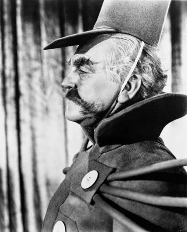 Frank Morgan As The Guardian Of The Gates.