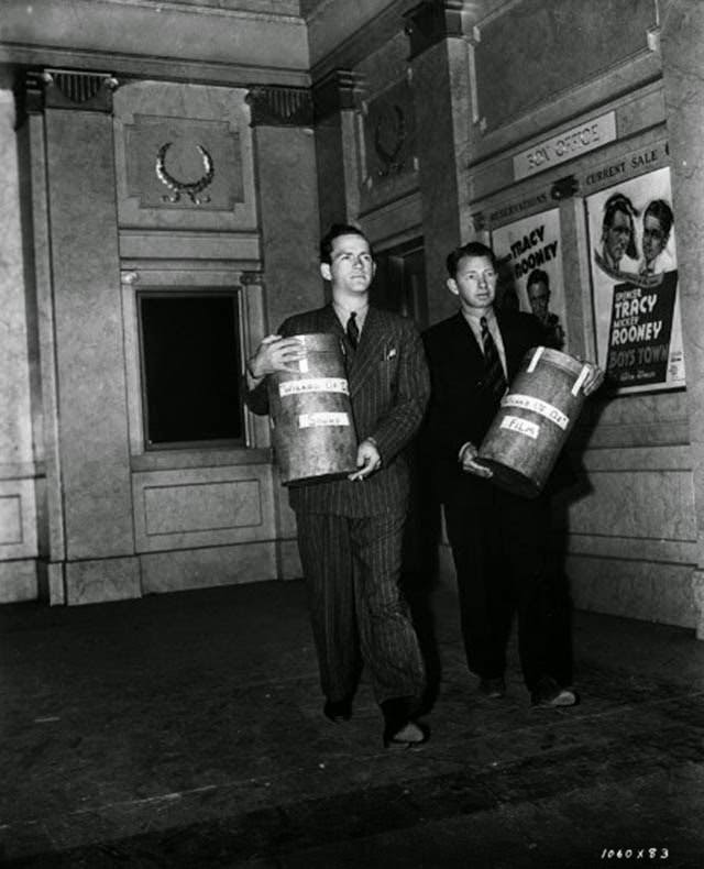 Two Men Carry The Sound And Visual Tracks For A Preview Of The Film. A Composite Print Was Made After The Previews And Final Edit Decisions Had Been Made.