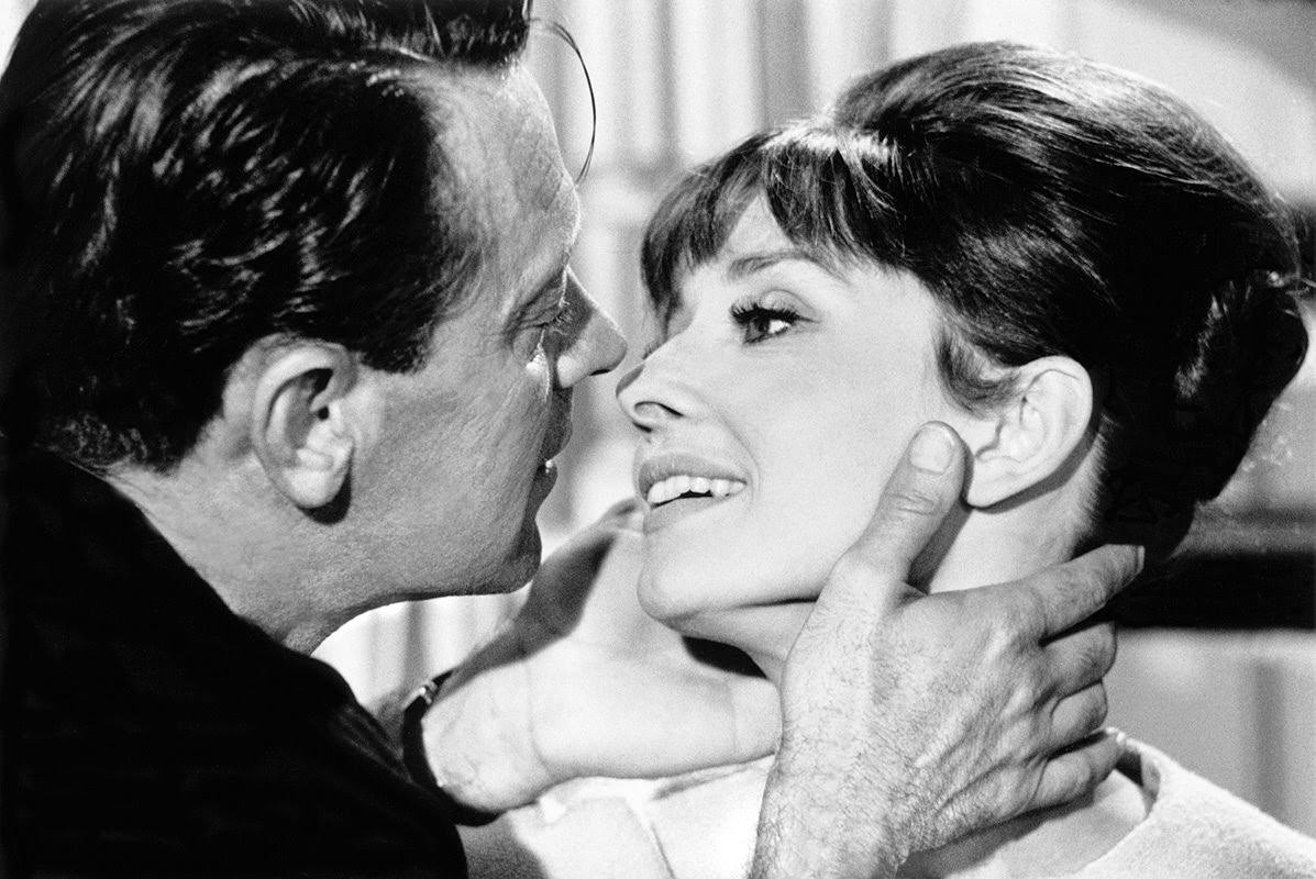 William Holden About To Kiss Audrey Hepburn On Set Of &Amp;Quot;Paris When It Sizzles&Amp;Quot; At Boulogne Studios In Paris, 1962.