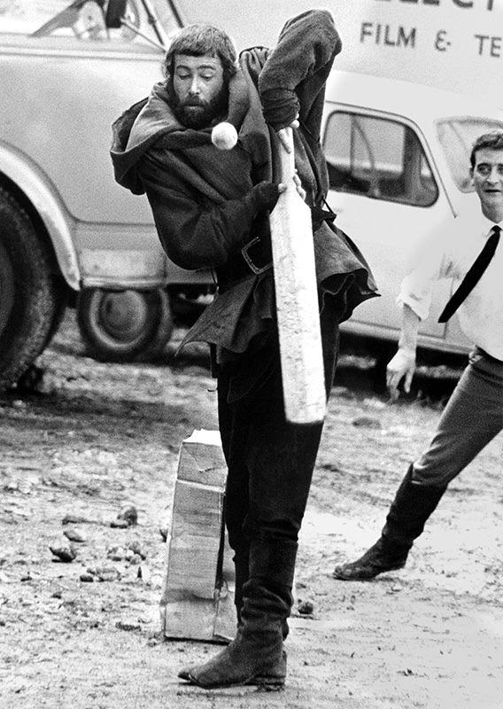 Peter O'Toole Dressed For His Role As King Henry Ii, Tries His Hand At Cricket On The French Location For &Amp;Quot;The Lion In Winter,&Amp;Quot; 1967.