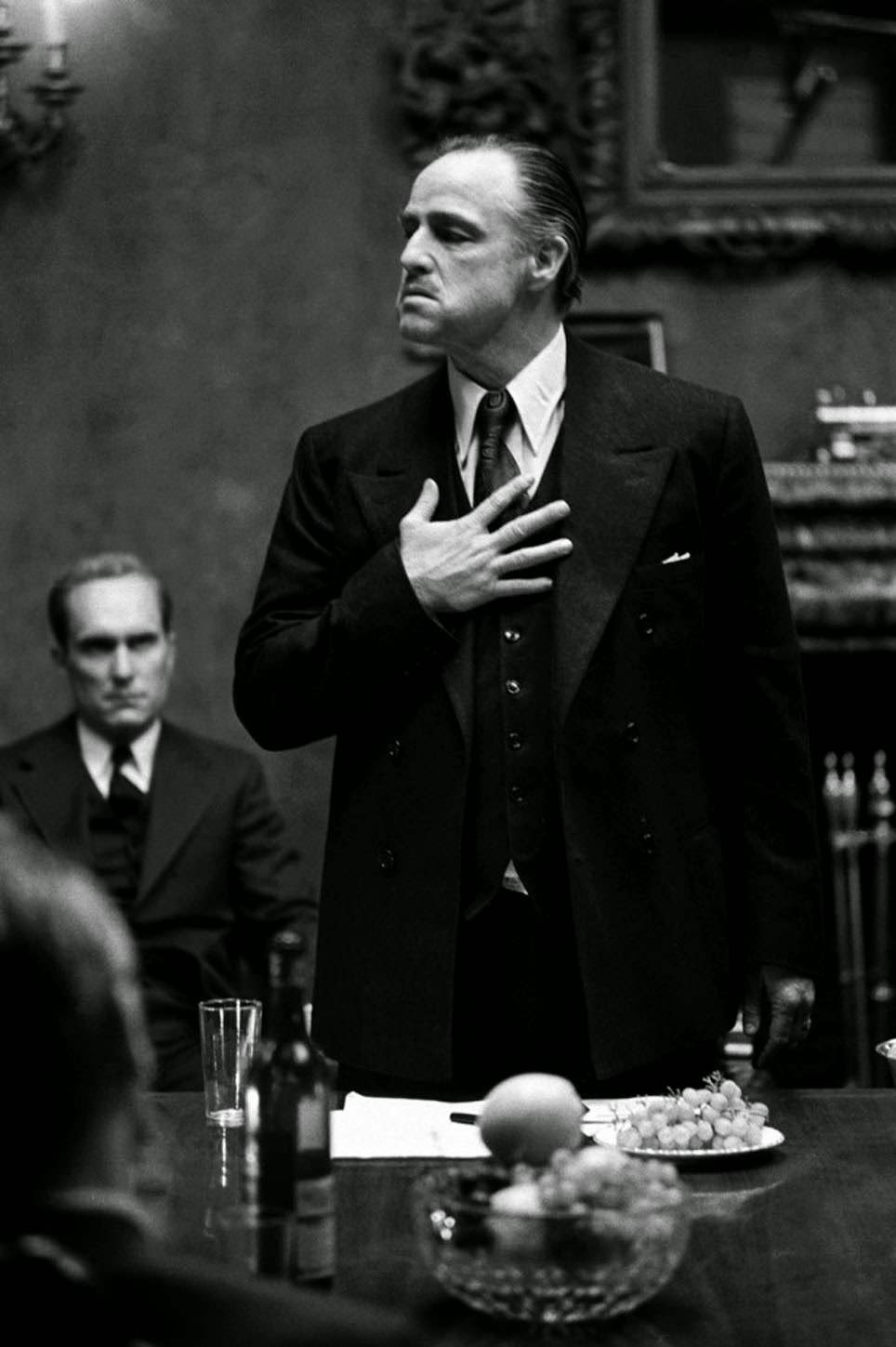 Don Vito Corleone (Marlon Brando) - Head Of The 'Family Business' Which Is An Italian Mob Organization He Forged Migrating To The United States.