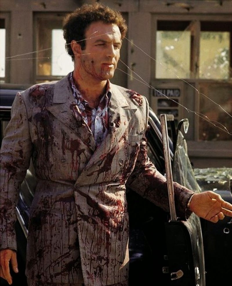 James Caan Takes A Break During Filming Of The Tollbooth Assassination Scene In Which His Character, Sonny Corleone.