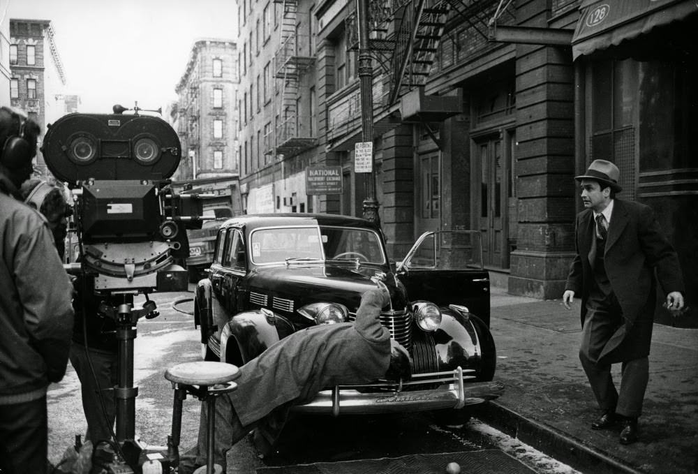 The Crew Films A Street Assassination Stunt, With John Cazale As Fredo Corleone, The Weak Link In The Corleone Family, Watching Helplessly From The Curb.