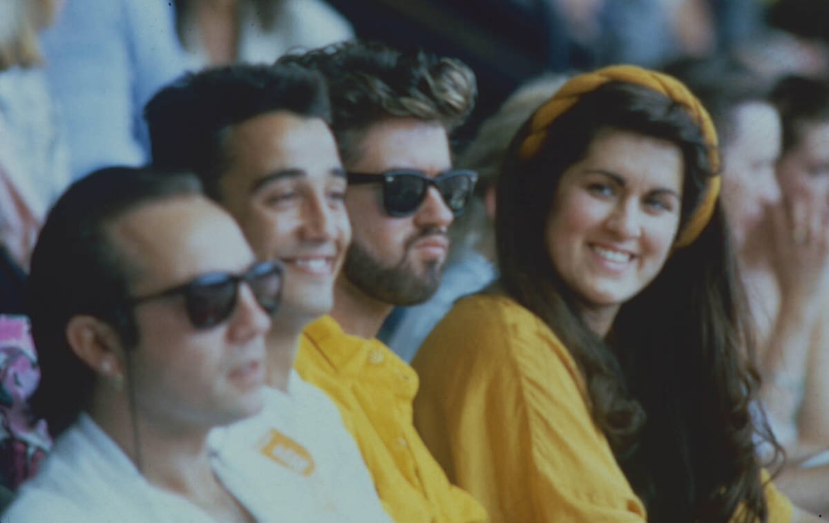 George Michael, Andrew Ridgeley, And Melanie Panayiotou Watching Live Aid From The Stands, 1985
