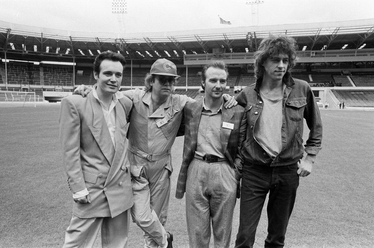 Adam Ant, Elton John, Midge Ure, And Bob Geldof Announcing The Live Aid Concerts, 1985