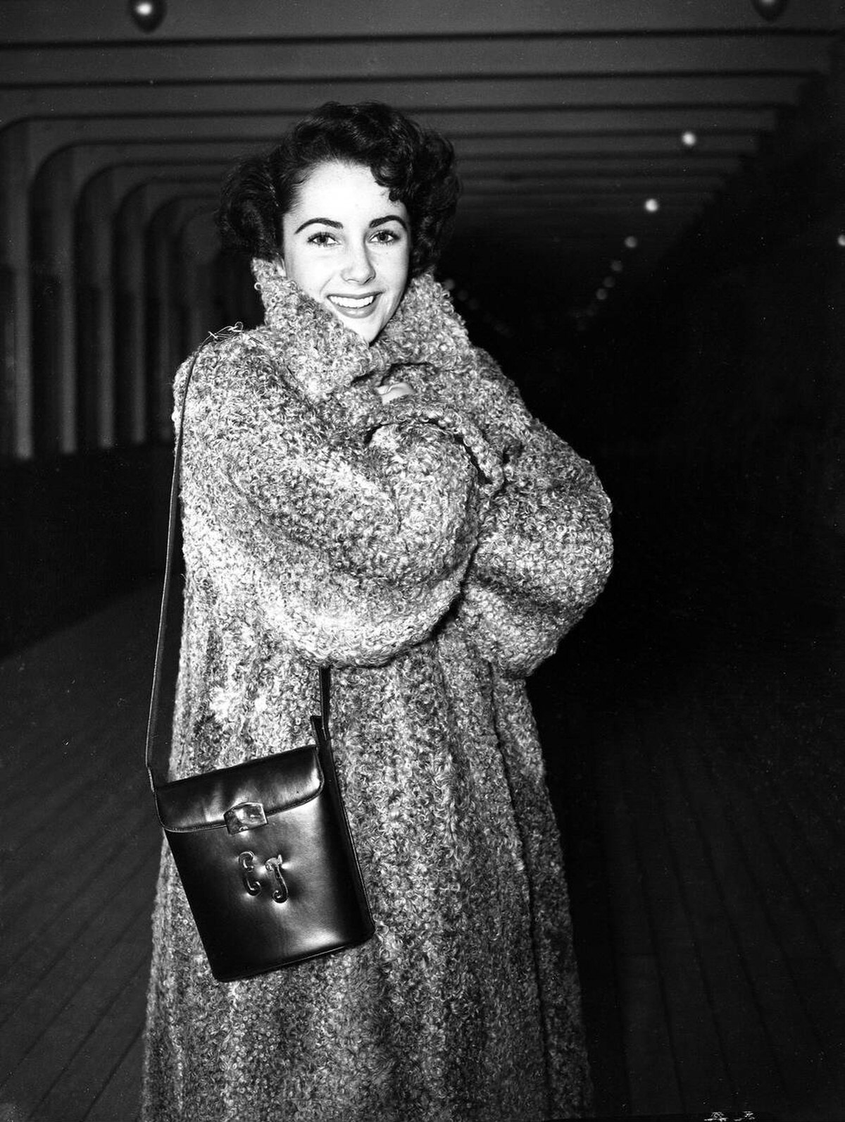Elizabeth Taylor Wearing A Persian Lamb Coat Arriving In England, 1948