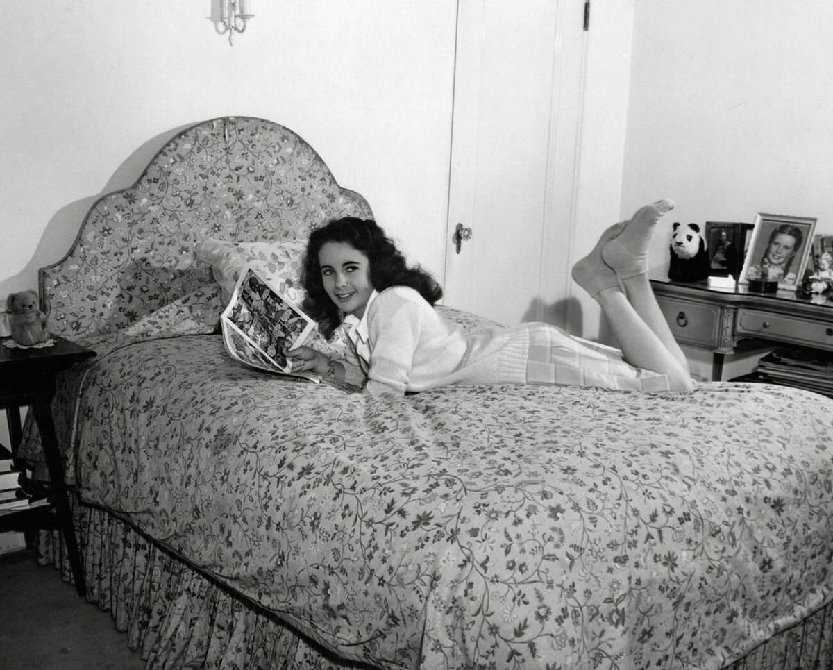 Elizabeth Taylor Reading A Comic Book In Bed, 1945