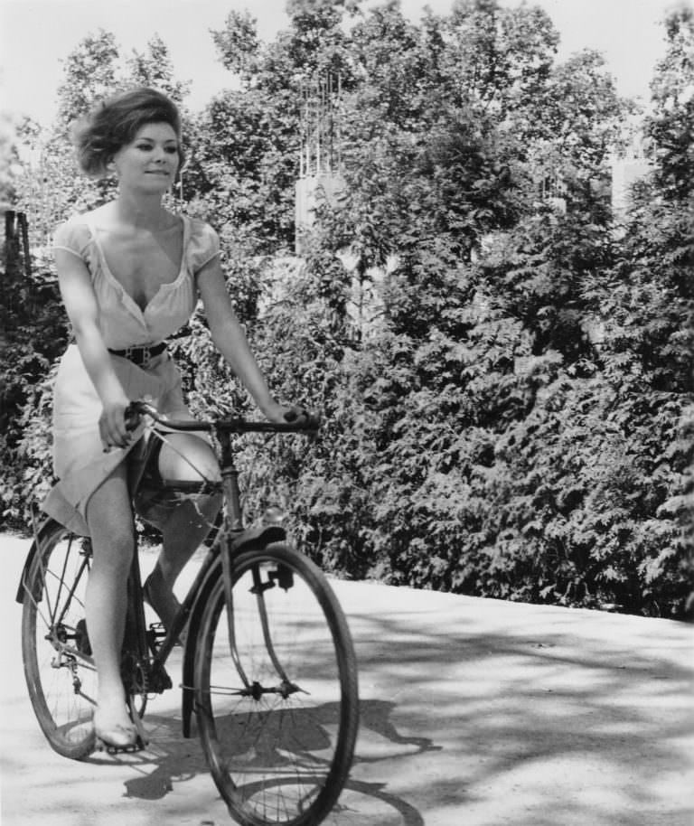 Irina Demick Riding A Bicycle, 1962.
