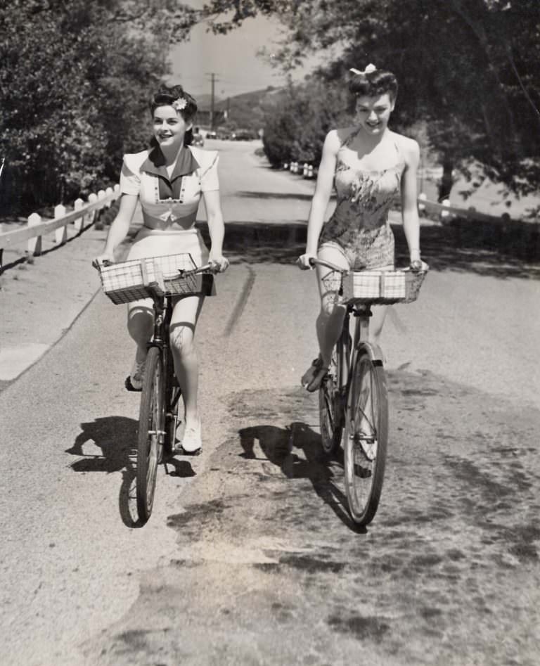 Marguerite Chapman And Leslie Brooks Riding Bicycles, 1947.
