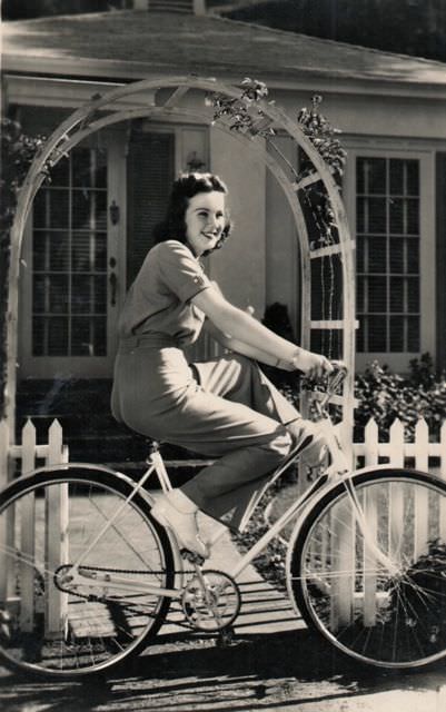 Deanna Durbin Riding A Bicycle, 1938.
