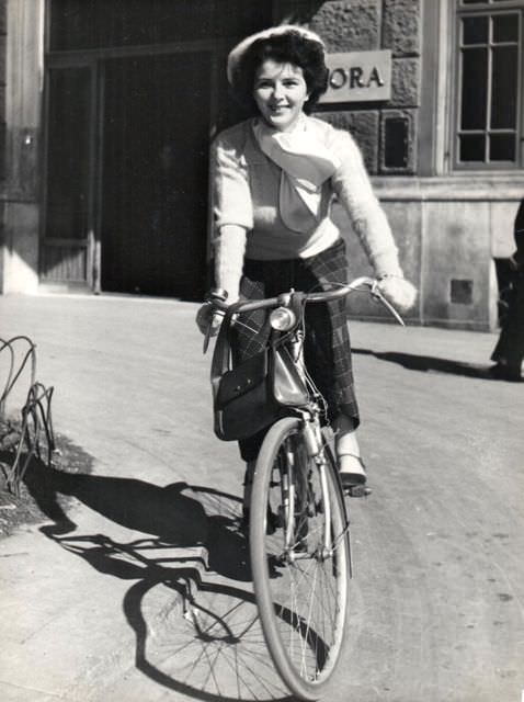 Delia Scala Rides A Bike.