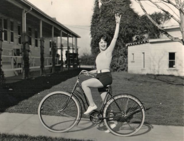 Margaret Livingston Rides A Bike, Waves Hello. On The Lot In 1924, Three Years Before “Sunrise.”