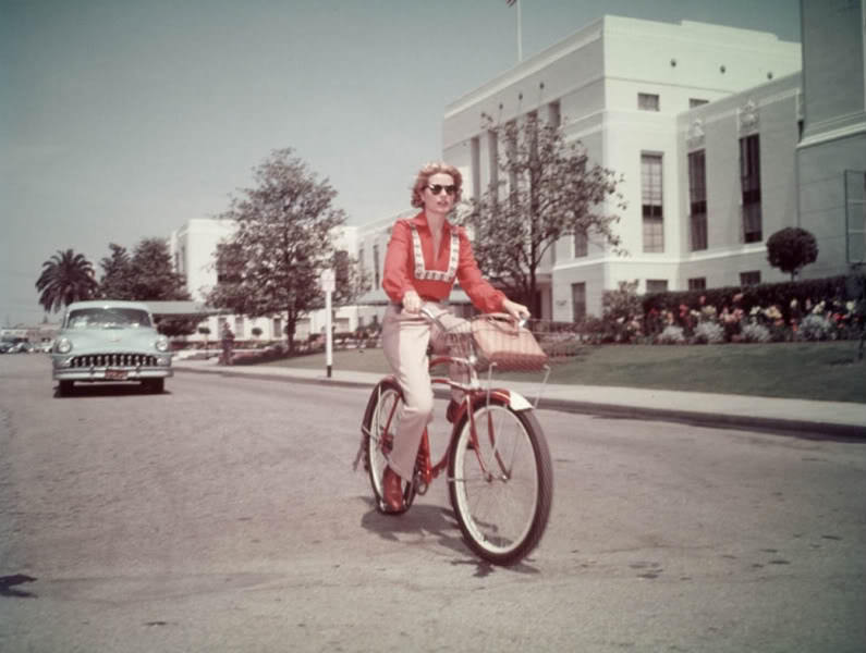 Grace Kelly Rides A Bike.