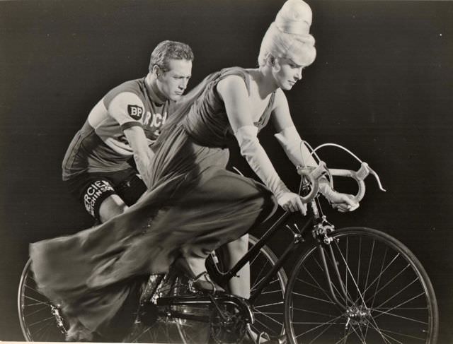 Joanne Woodward And Paul Newman Ride Bikes.