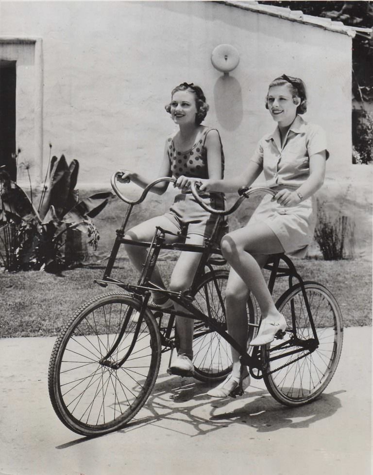 Jean Howard And Irene Hervey Riding A Buddy Bike On The Mgm Lot, 1933.